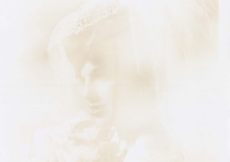 A faint portrait of a bride in sepia tones.