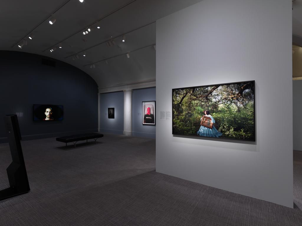 National Portrait Gallery's 2019 Exhibition Walk-Through 3: Portrait hanging on a standalone wall while you face into a corner of the gallery