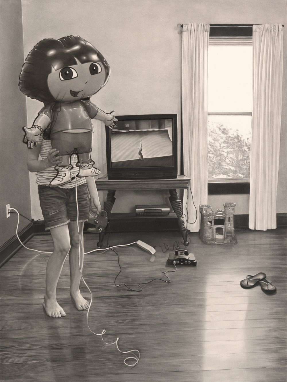 Person holding a large cartoon balloon in front of themselves in a bare room with a TV and a gaming console on the floor